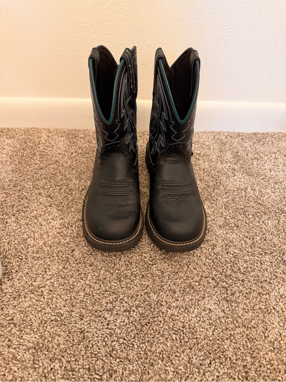 Black Western Justin boots with Turquoise Trim
